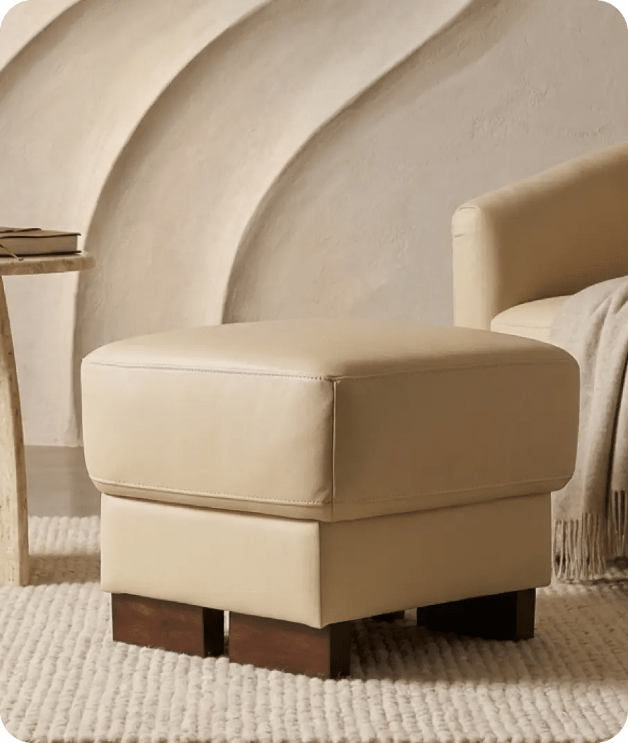 dalmore-cream-leather-footstool-in-a-uk-living-room