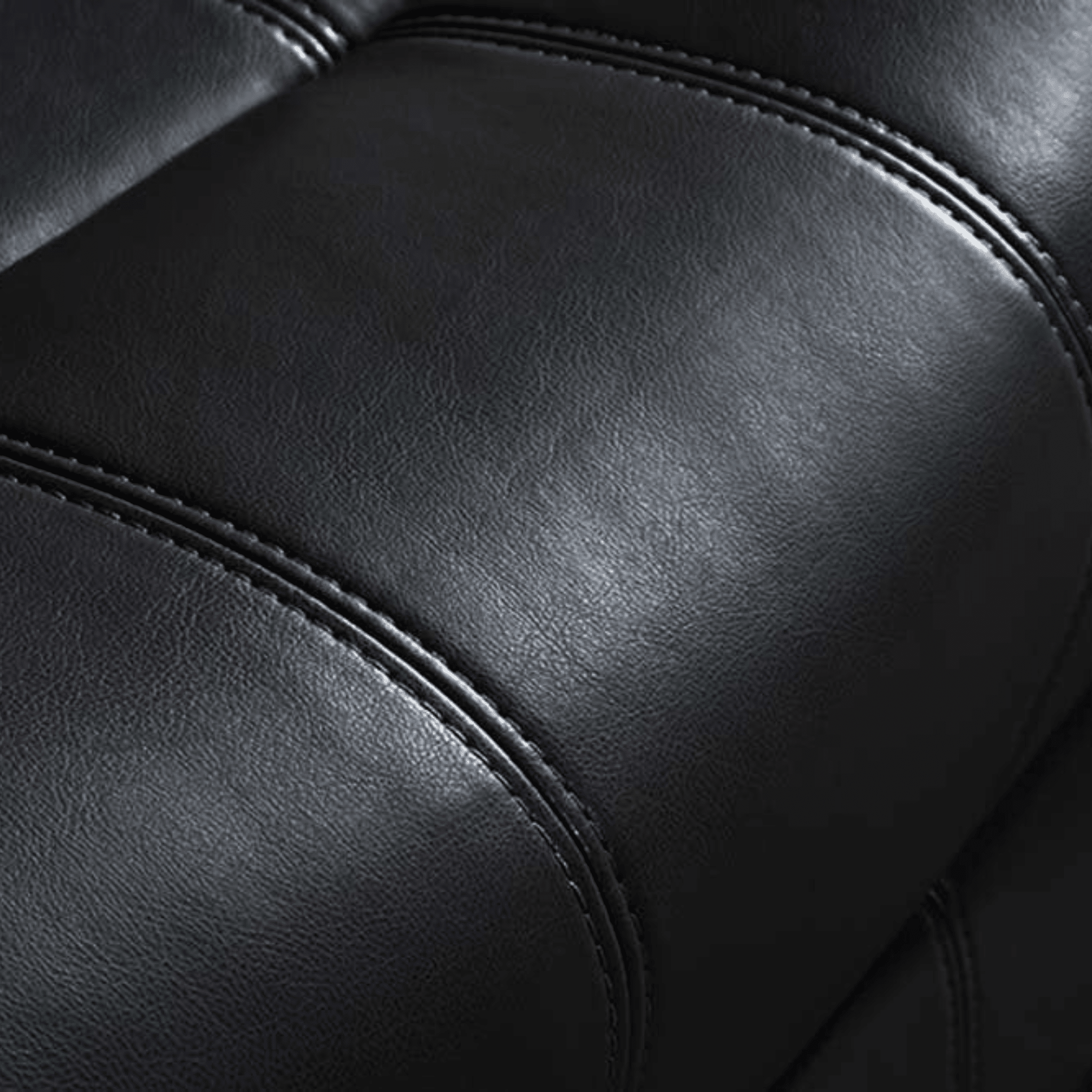 Close-up of black leather sofa texture