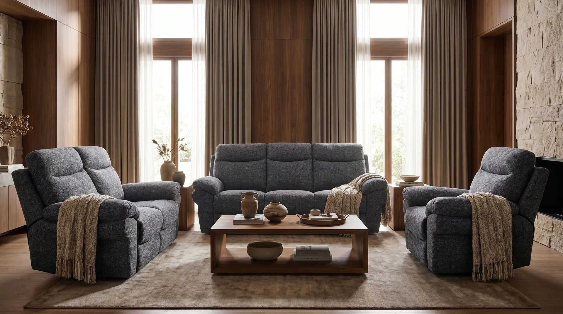 3 Grey sofas in a living room