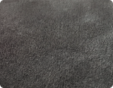 Close-up of a textured gray fabric surface