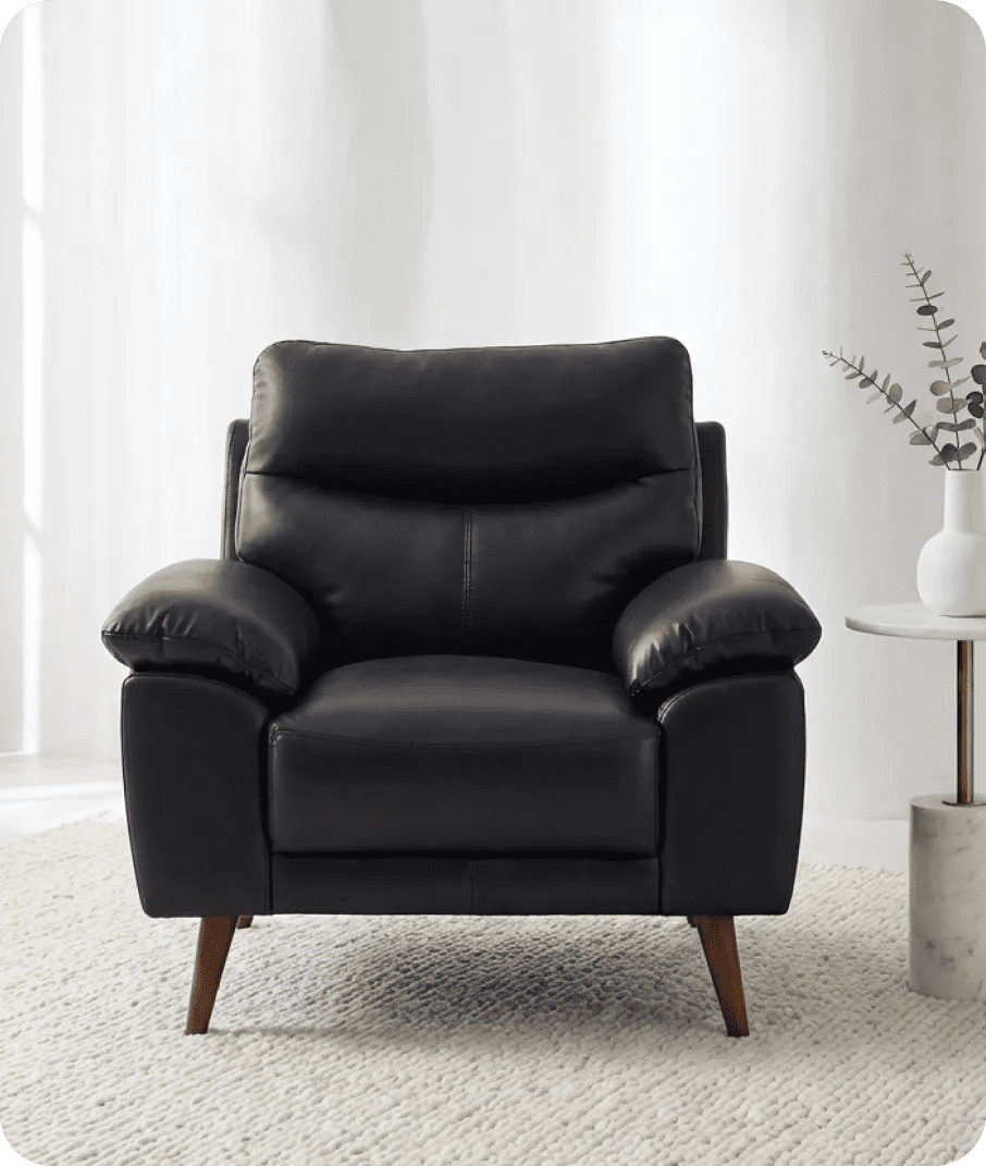 ascot-black-leather-armchair-in-a-uk-living-room