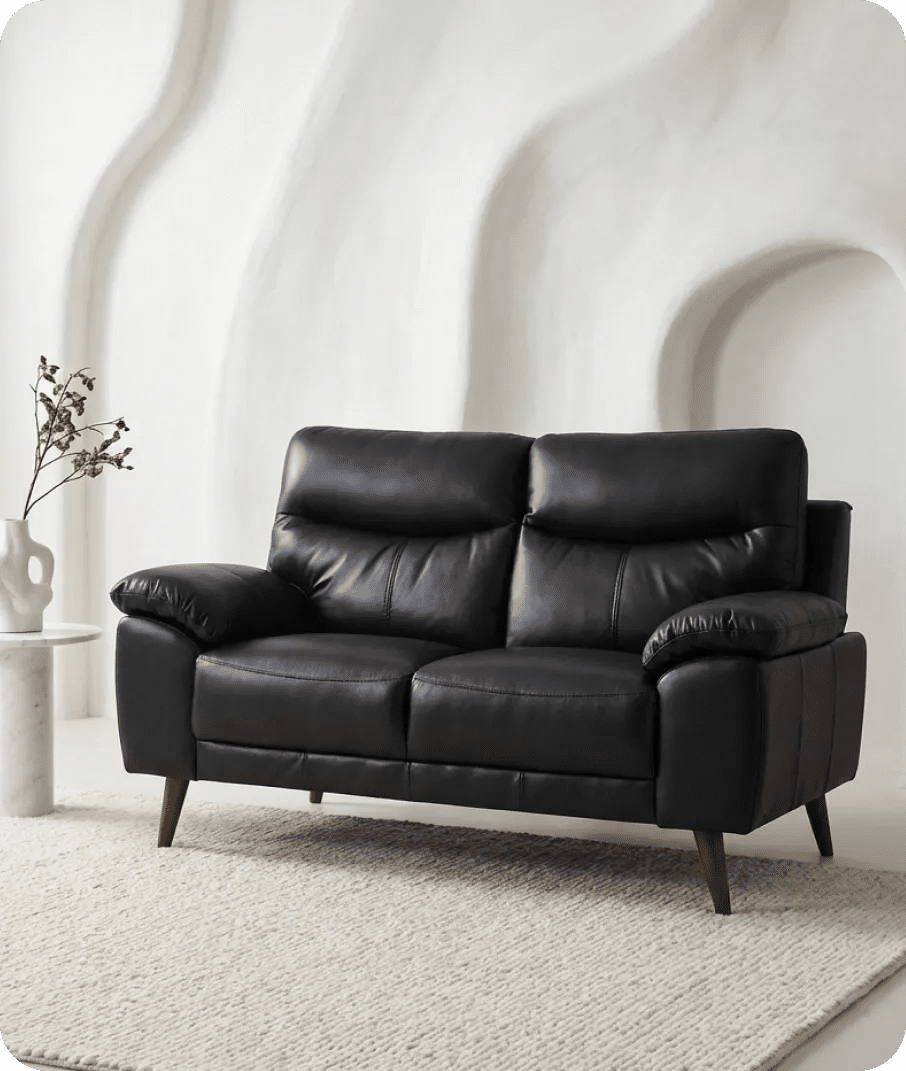 ascot-black-leather-2-seater-sofa-in-a-uk-living-room
