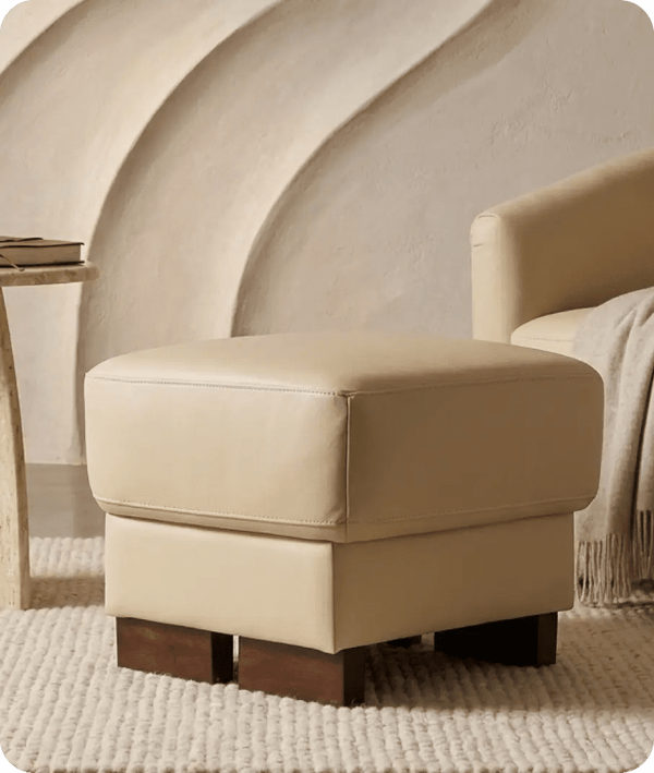 dalmore-cream-leather-footstool-in-a-uk-living-room
