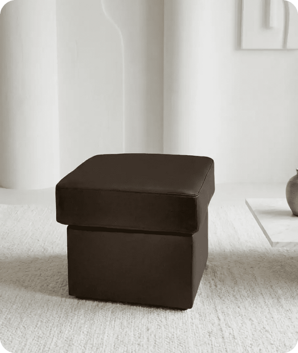 veloura-brown-leather-footstool-sofa-in-a-uk-living-room