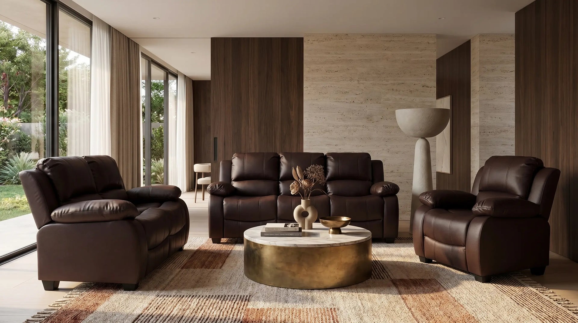 Modern living room with brown leather furniture and a decorative coffee table.