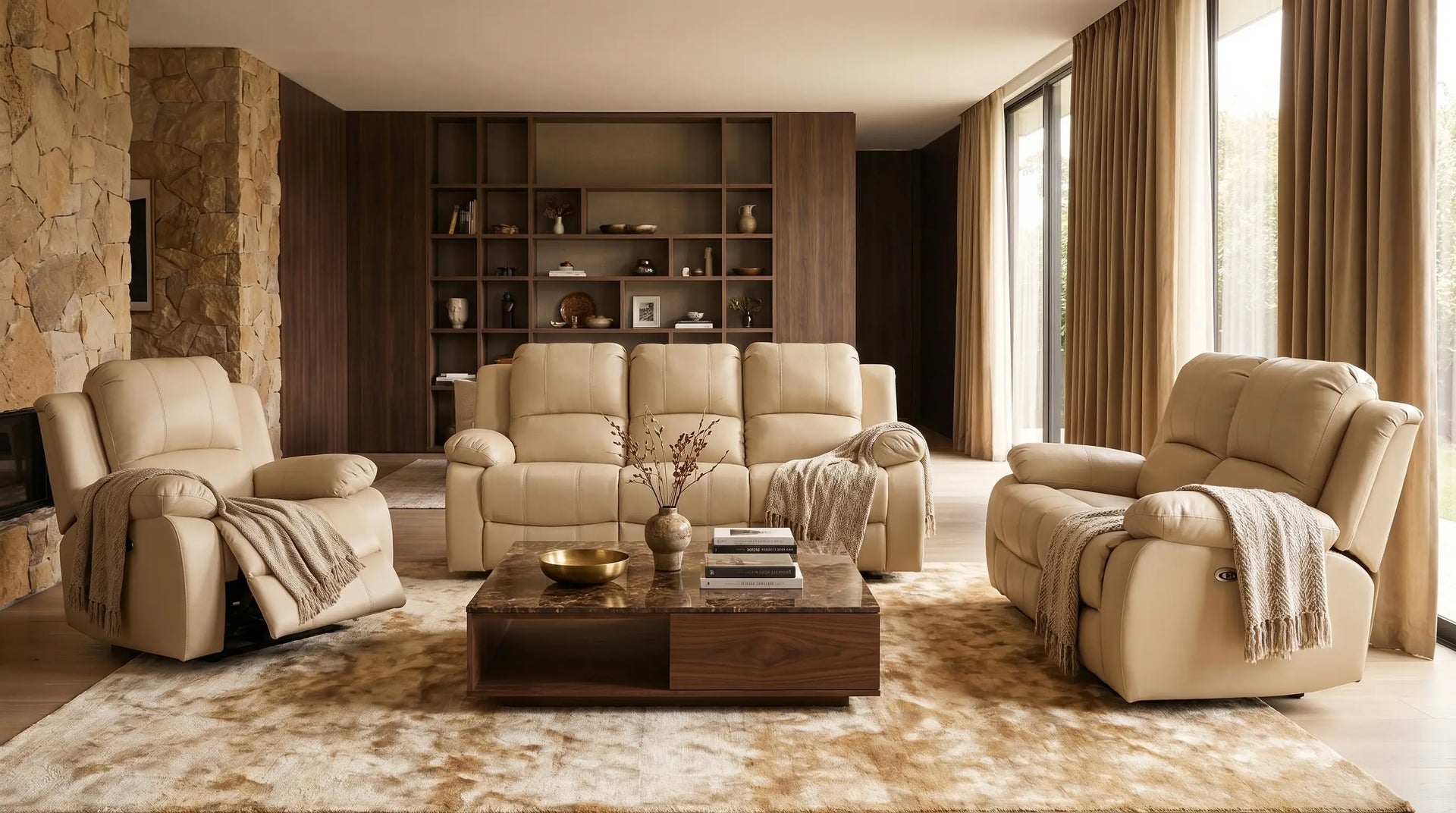 Beige recliner sofa set in a living room with wooden coffee table and decorative items.